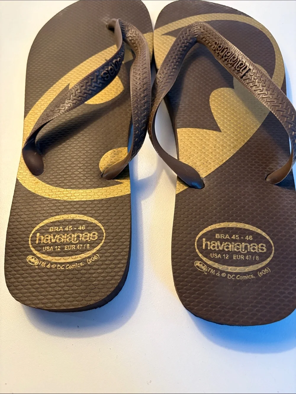 THREE pairs of men’s flip flops